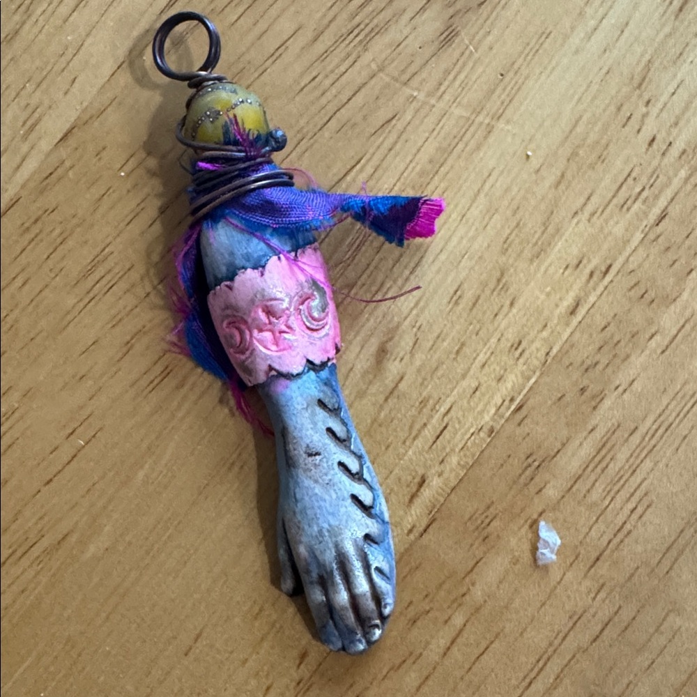 Colorful mystical fortuneteller’s hand pendant